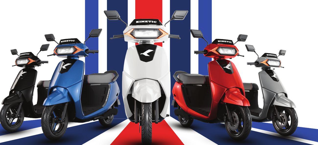 Kinetic DX+ electric scooter in black, blue, white, red and grey